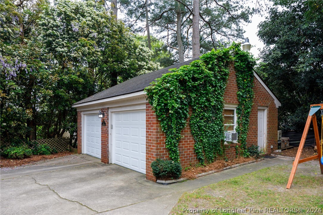 2519 Huntington Road Fayetteville, NC 28303 - Photo 35 of 36 a view of a house with backyard and garden