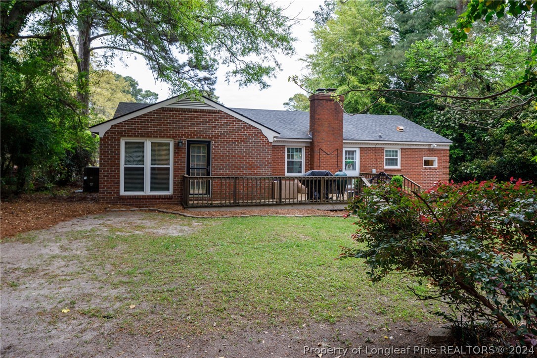 2519 Huntington Road Fayetteville, NC 28303 - Photo 36 of 36 a front view of a house with a garden