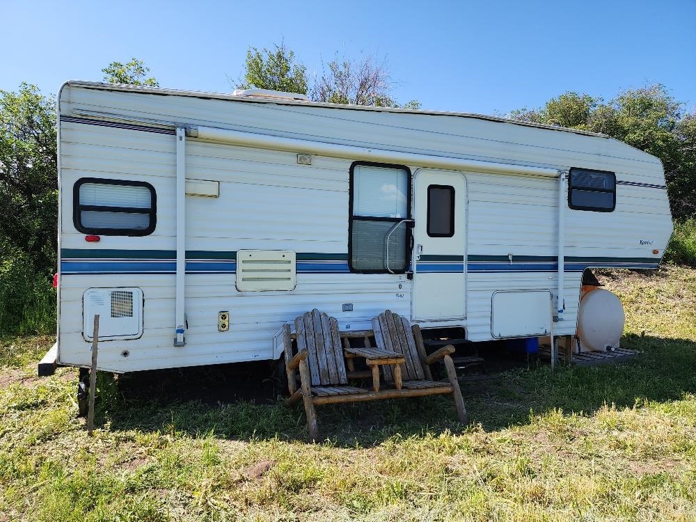 Lot 18 Harrison Creek Road Collbran, CO 81624 - Photo 17 of 30 a view of a house with wooden fence