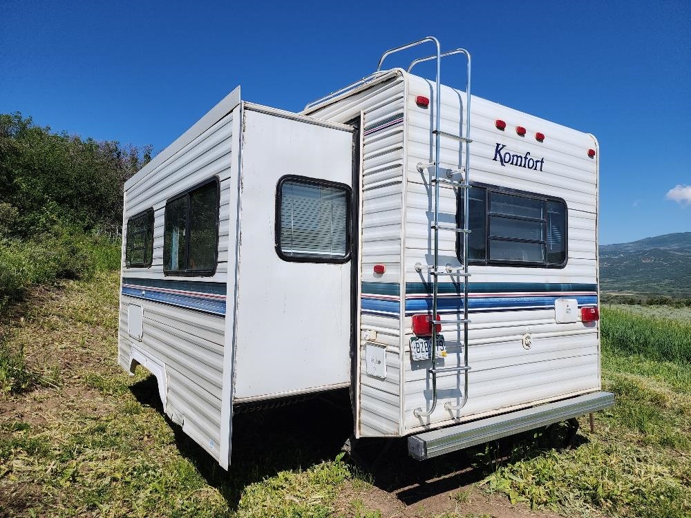 Lot 18 Harrison Creek Road Collbran, CO 81624 - Photo 23 of 30 a view of a house with a white house