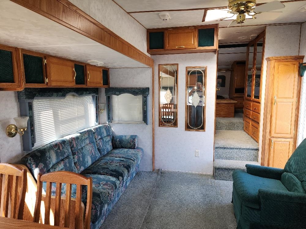 Lot 18 Harrison Creek Road Collbran, CO 81624 - Photo 27 of 30 a living room with furniture and a window