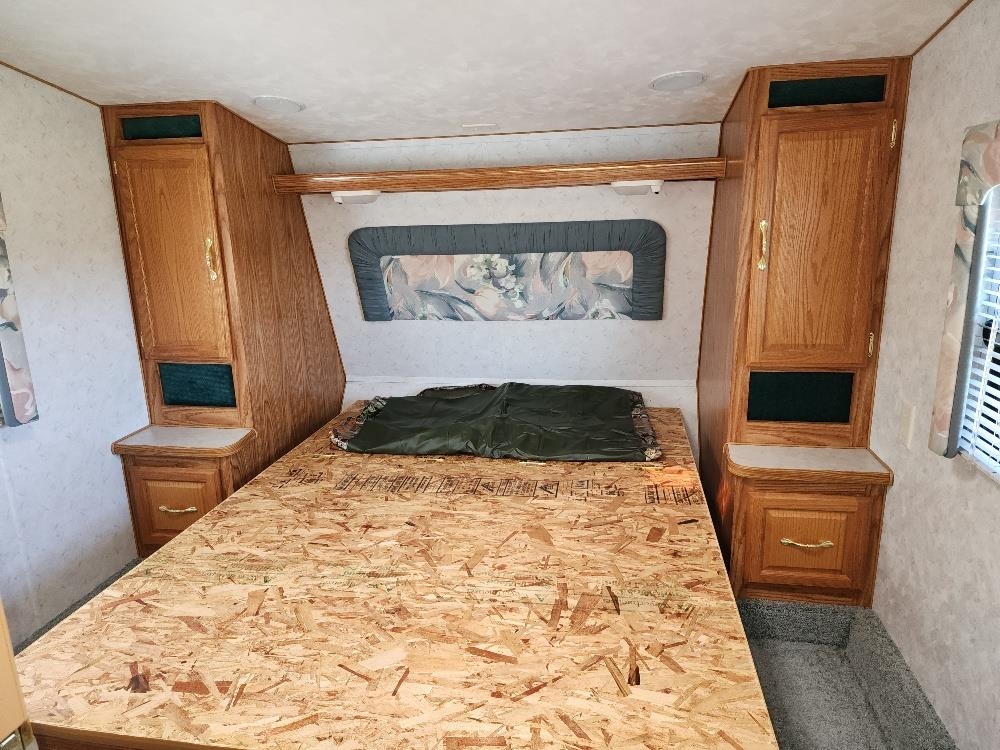 Lot 18 Harrison Creek Road Collbran, CO 81624 - Photo 30 of 30 a view of a fireplace in a hallway