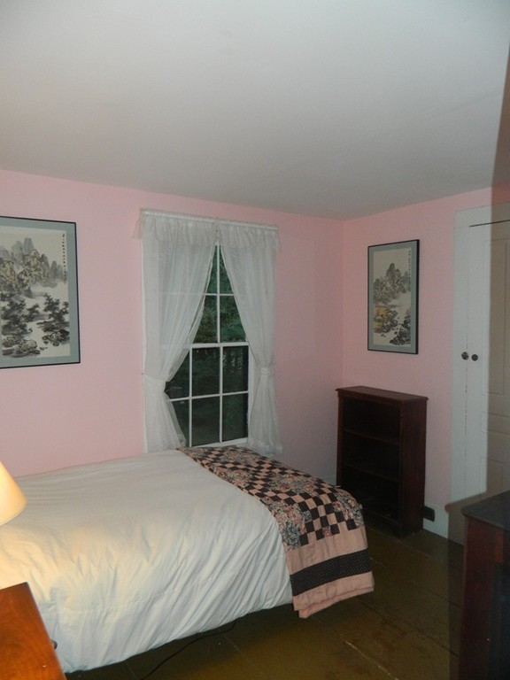 172 Long Plain Road Leverett, MA 01054 - Photo 18 of 30 a bedroom with a bed and a window