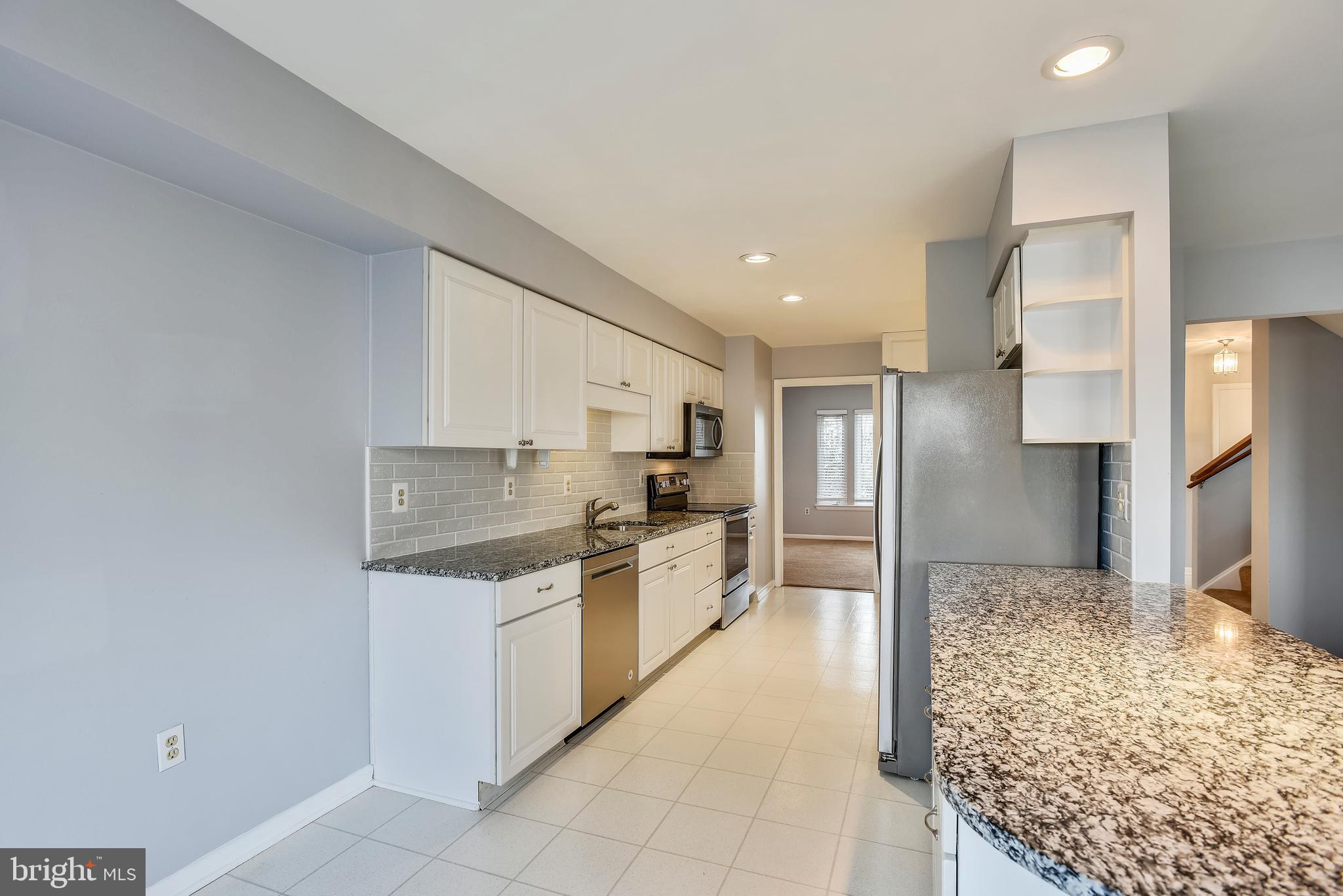2051 Swans Neck Way Reston, VA 20191 - Photo 4 of 35 Granite counters in kitchen