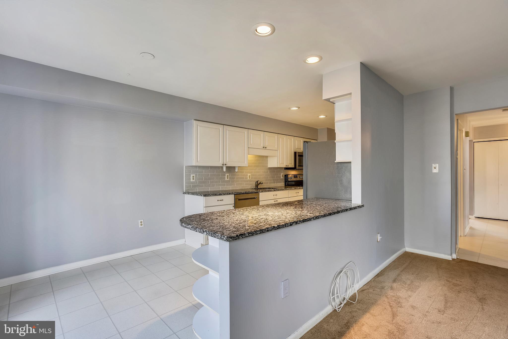 2051 Swans Neck Way Reston, VA 20191 - Photo 6 of 35 Living Room/Kitchen