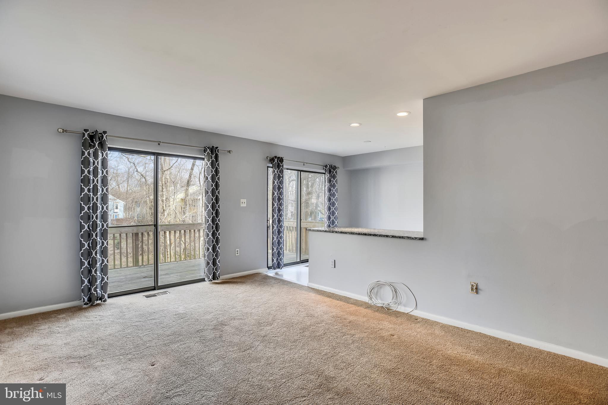 2051 Swans Neck Way Reston, VA 20191 - Photo 8 of 35 Living Room opens to large deck