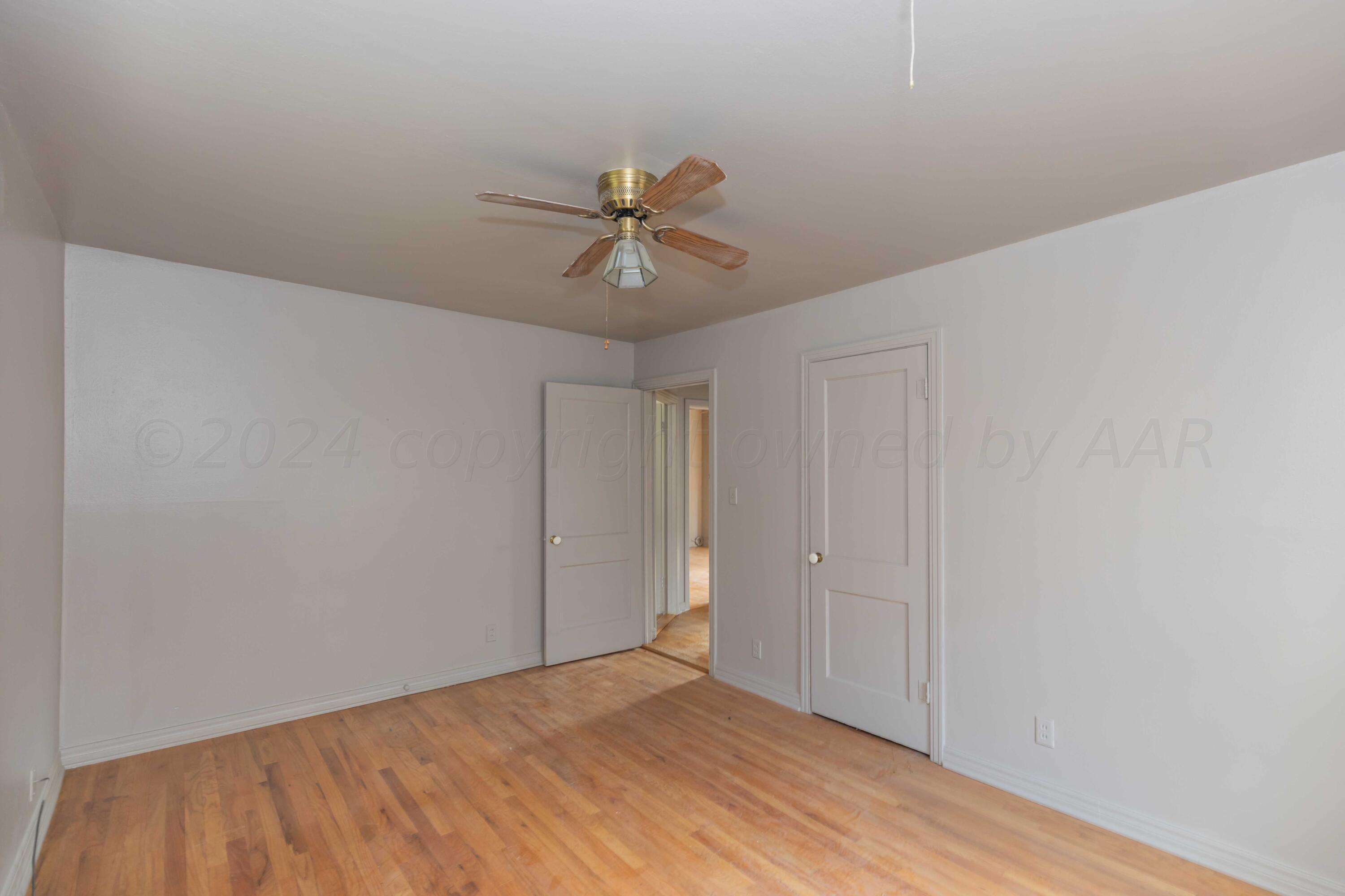 1613 South Travis Street Amarillo, TX 79102 - Photo 19 of 49 a view of a big room with carpet