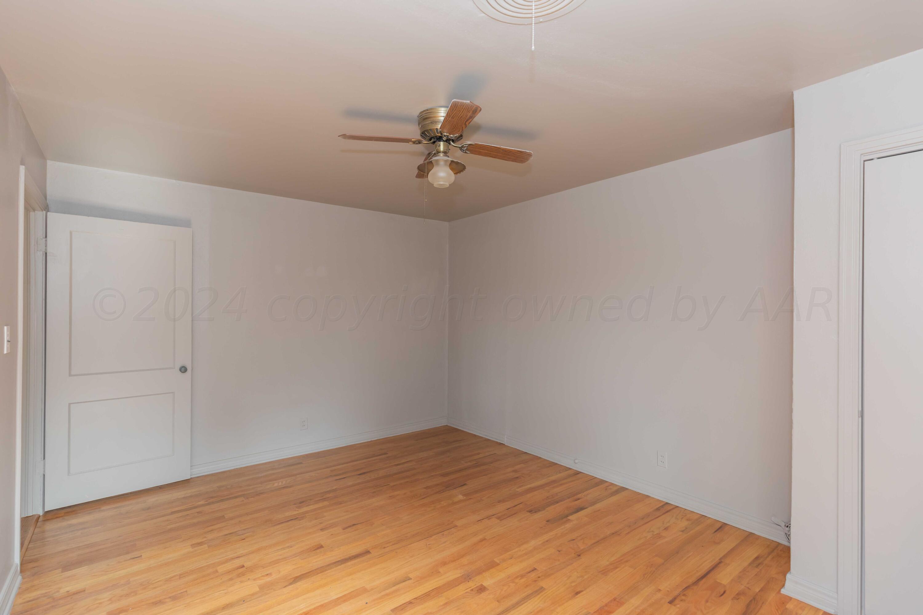 1613 South Travis Street Amarillo, TX 79102 - Photo 29 of 49 a view of a room with a ceiling fan