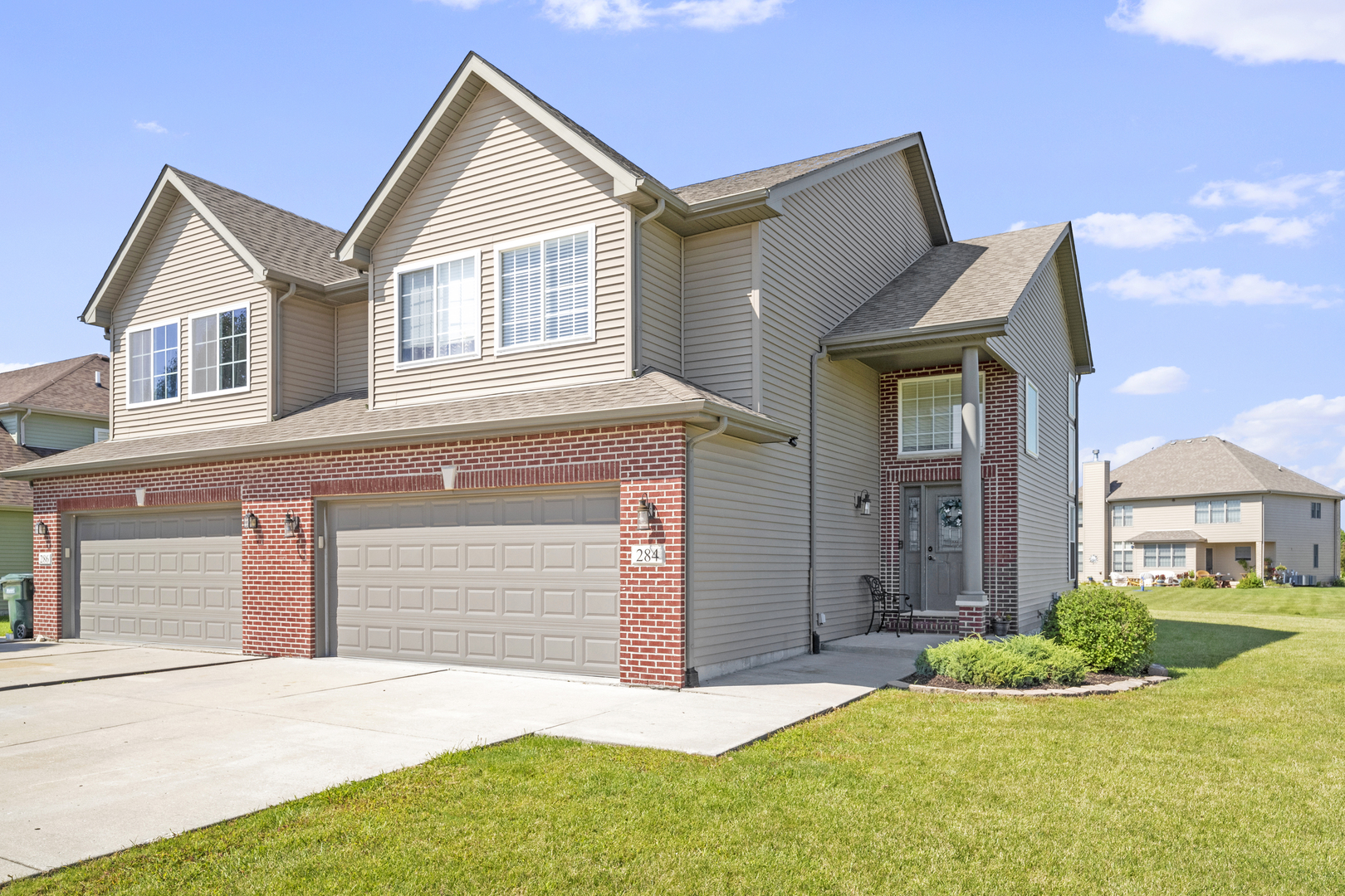 284 South Will Road Diamond, IL 60416 - Photo 1 of 23 front view of a house and a yard
