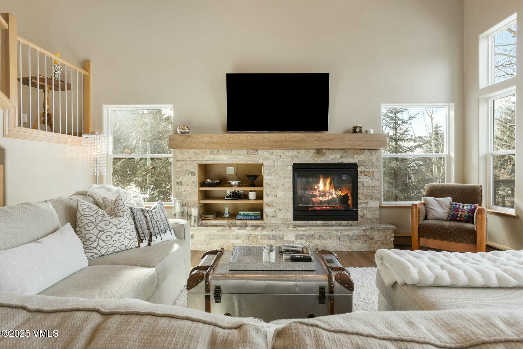 85 Remington Trail Edwards, CO 81632 - Photo 11 of 41 a living room with furniture fireplace and flat screen tv