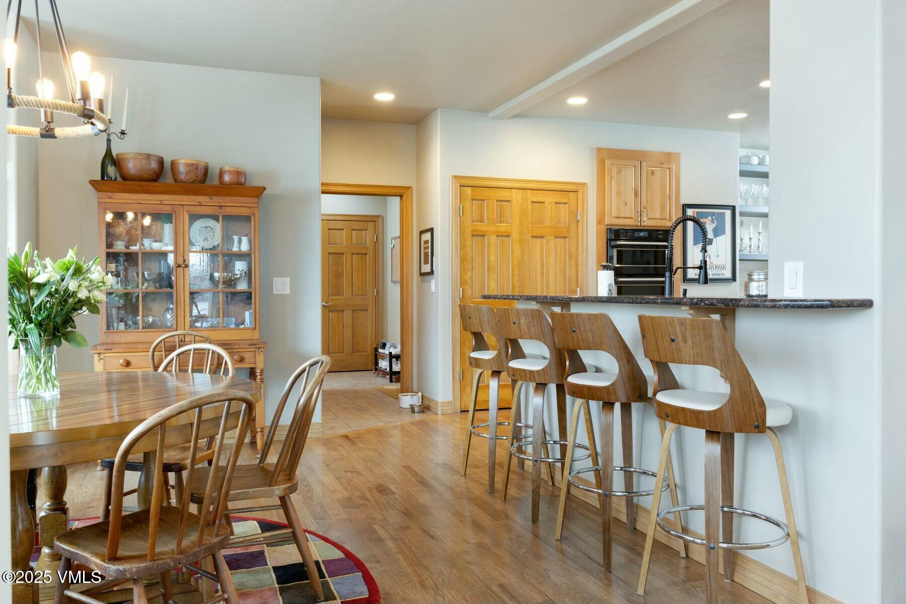 85 Remington Trail Edwards, CO 81632 - Photo 16 of 41 a view of a dining room with furniture and chandelier