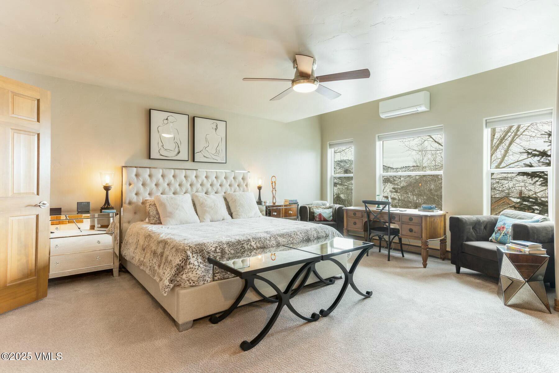 85 Remington Trail Edwards, CO 81632 - Photo 7 of 41 a bedroom with furniture and a large window