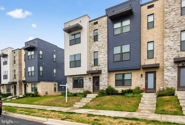 a view of a building with a yard