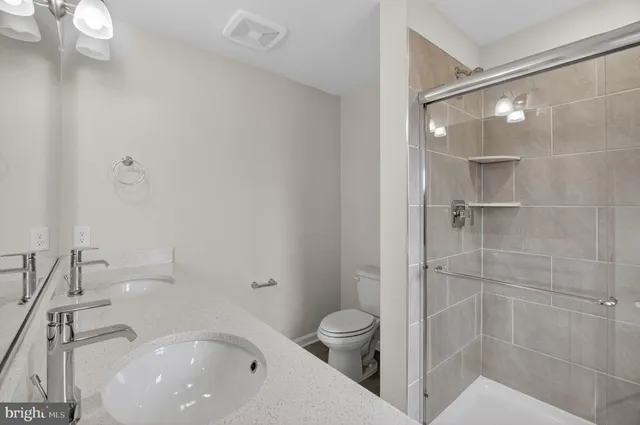 a bathroom with a sink and toilet