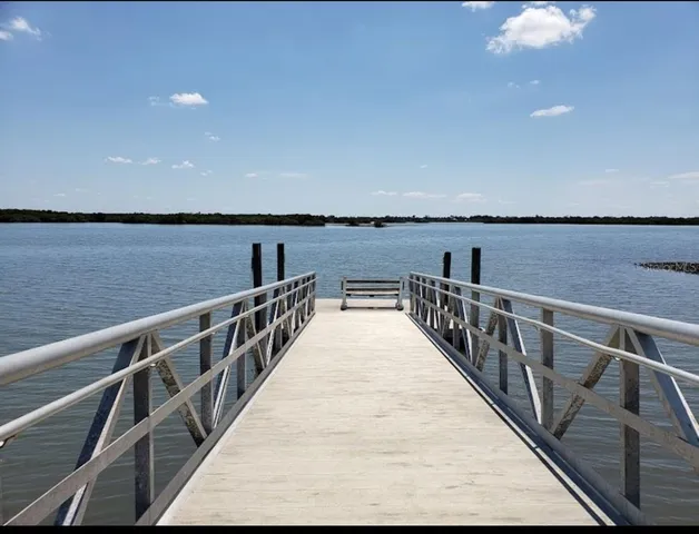 a view of balcony with furniture