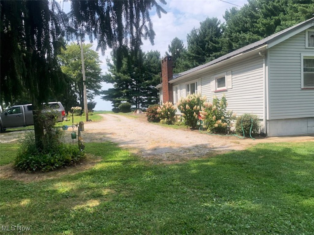 209 North State Line Road Greenville, PA 16125 - Photo 13 of 14 View of green lawn with view of scattered trees