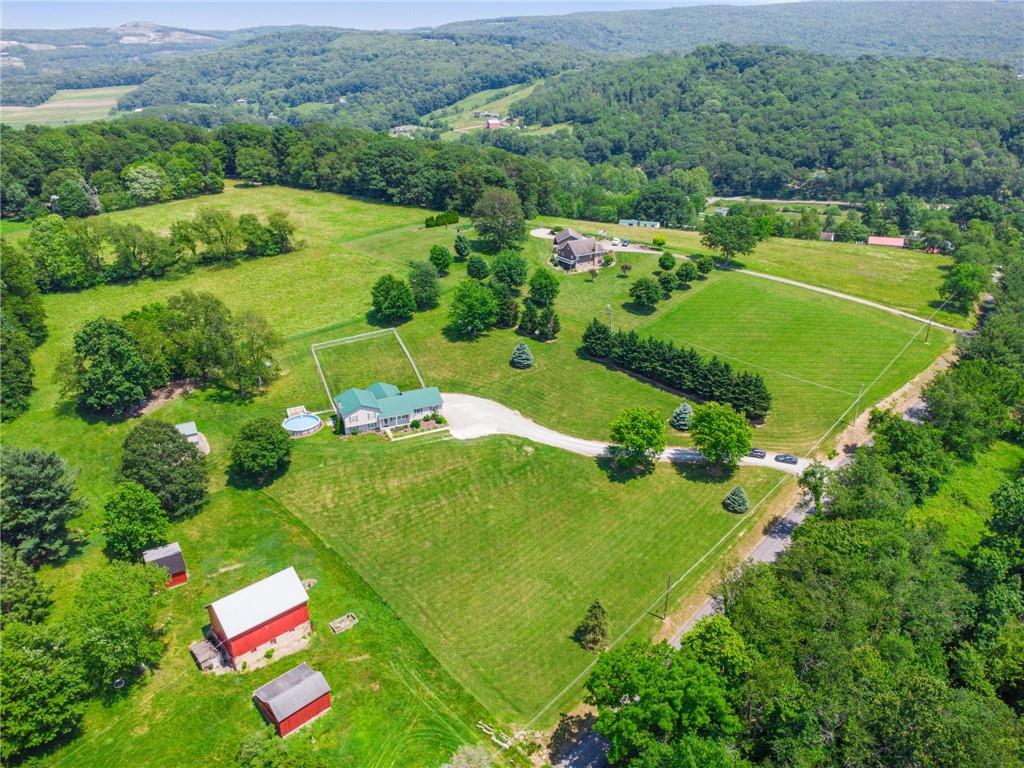 142 Poorbaugh Road Connellsville, PA 15425 - Photo 27 of 41 an aerial view of a golf course with huge green field