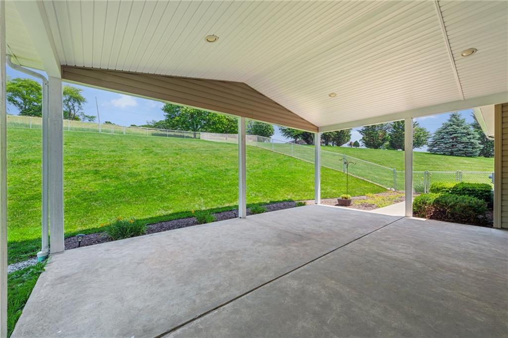 142 Poorbaugh Road Connellsville, PA 15425 - Photo 34 of 41 a view of a porch and garden