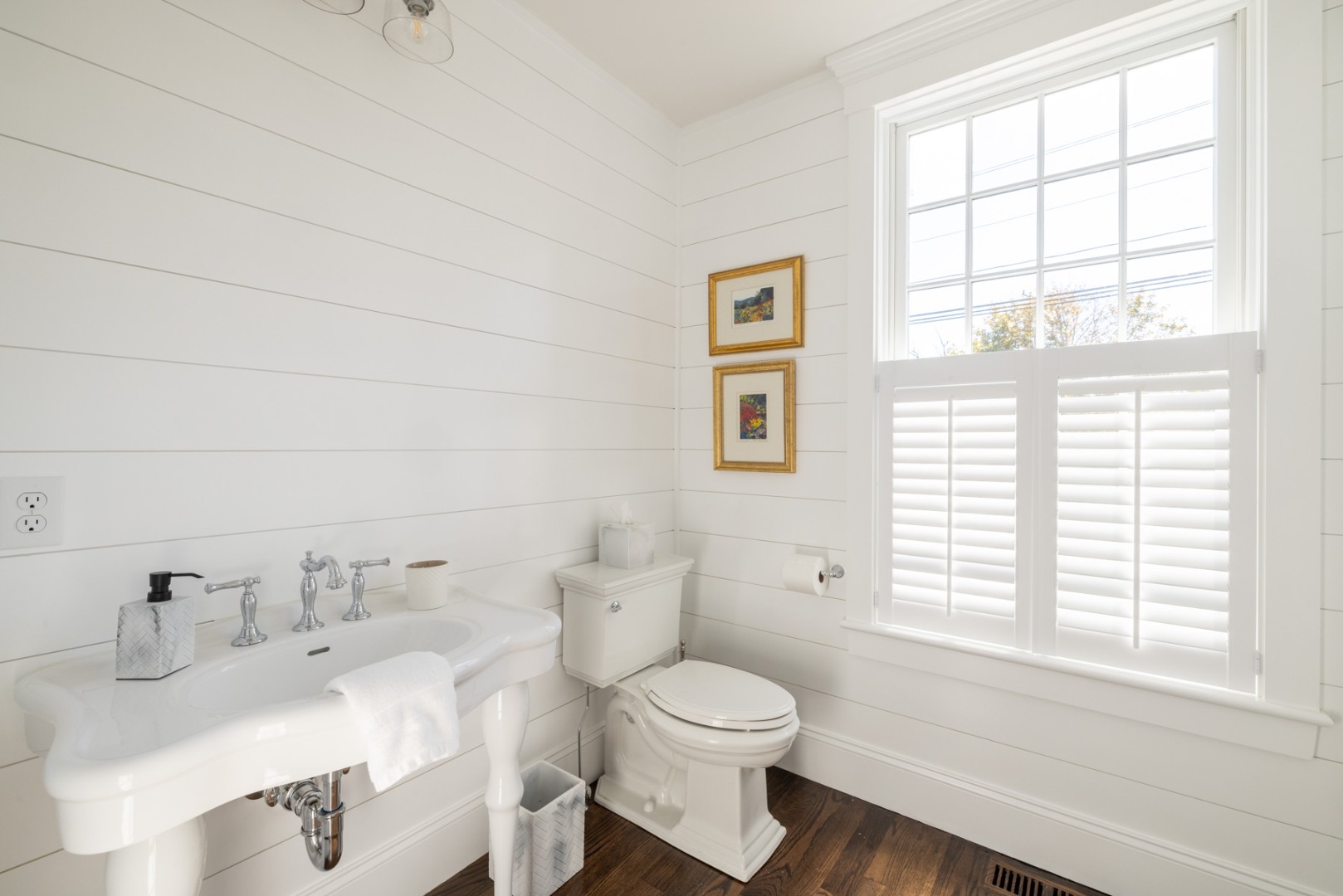 183 Upper Main Street Edgartown, MA 02539 - Photo 11 of 33 a bathroom with a toilet a sink and a window