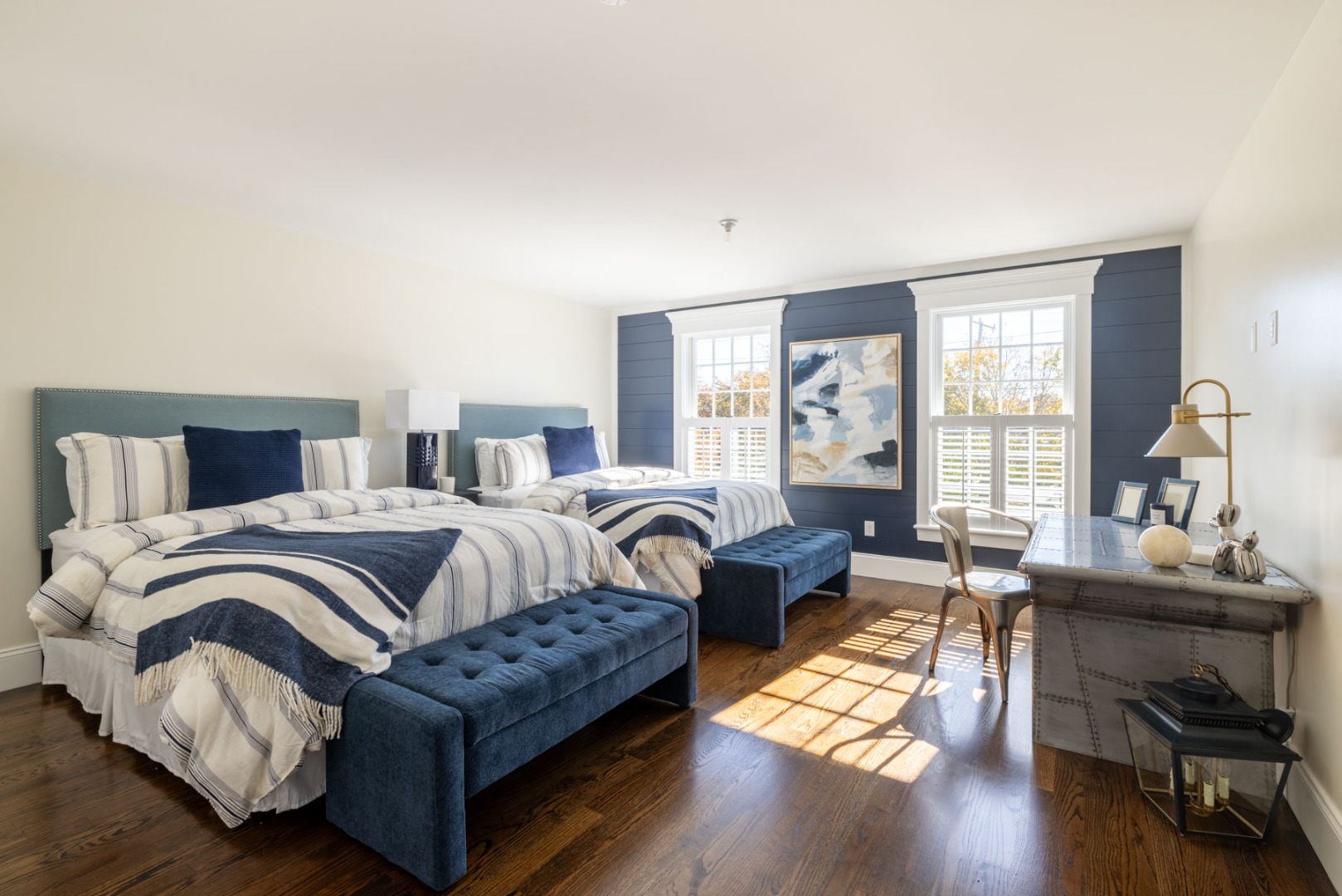 183 Upper Main Street Edgartown, MA 02539 - Photo 12 of 33 a bedroom with a bed and wooden floor