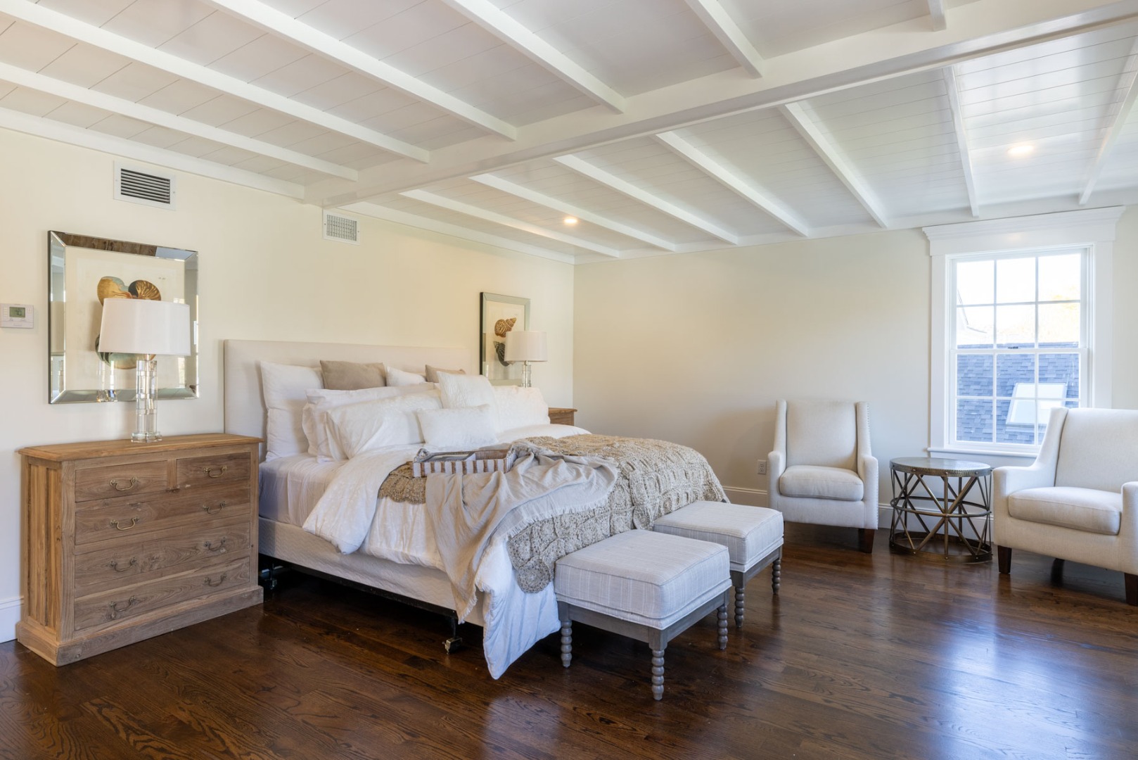 183 Upper Main Street Edgartown, MA 02539 - Photo 15 of 33 a bedroom with a bed and wooden floor