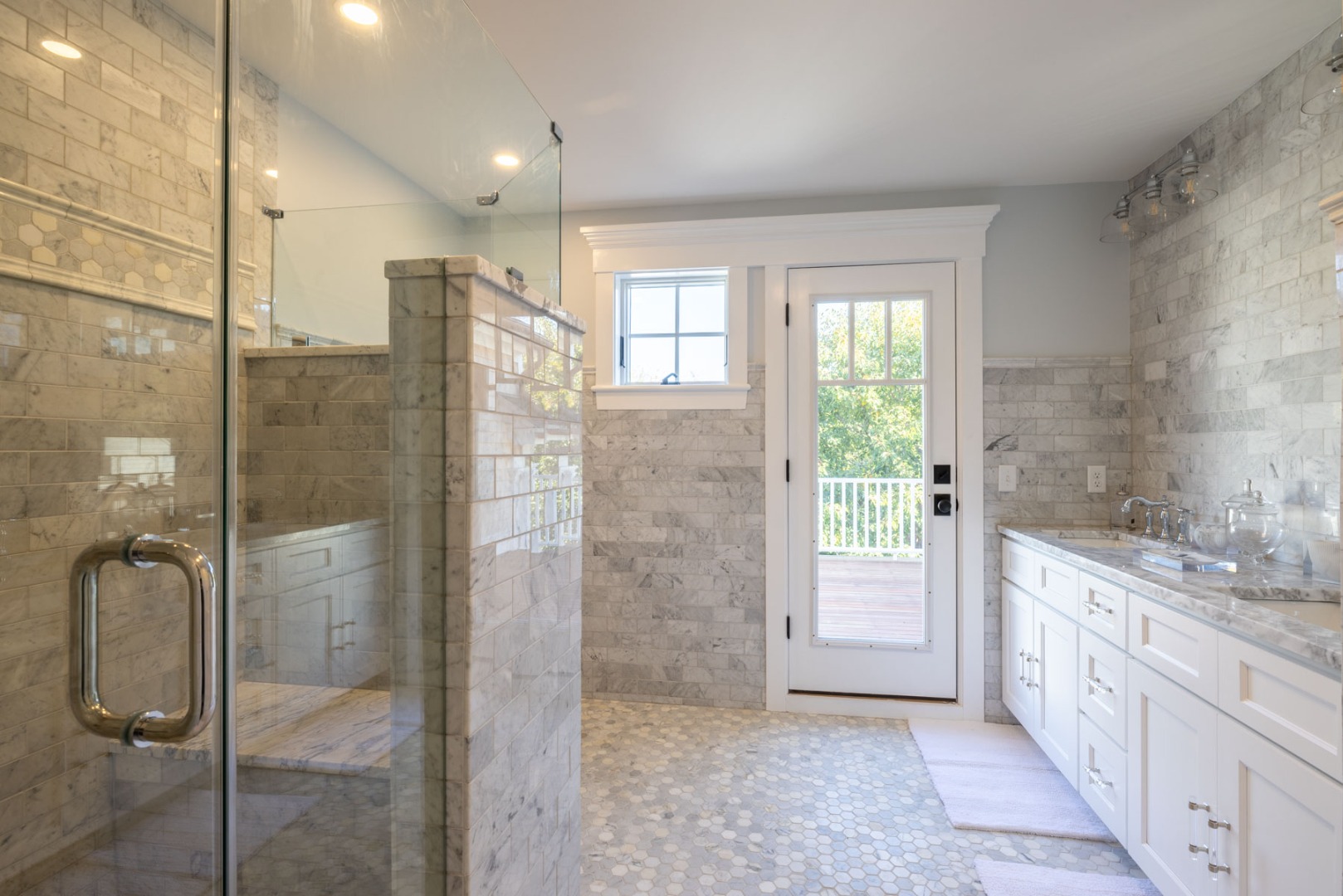 183 Upper Main Street Edgartown, MA 02539 - Photo 16 of 33 a bathroom with a glass shower door and a sink