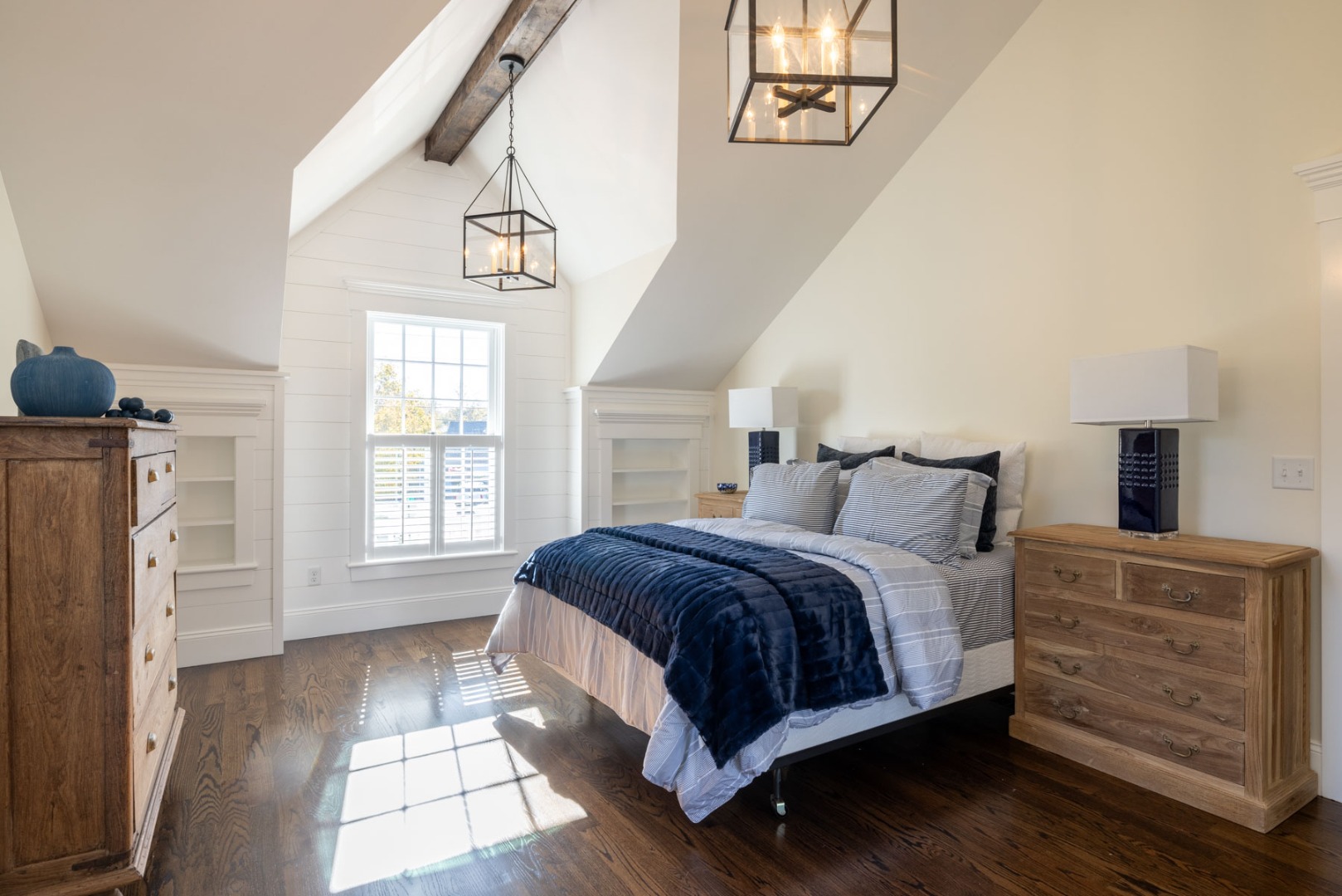 183 Upper Main Street Edgartown, MA 02539 - Photo 18 of 33 a bedroom with a large bed and a window