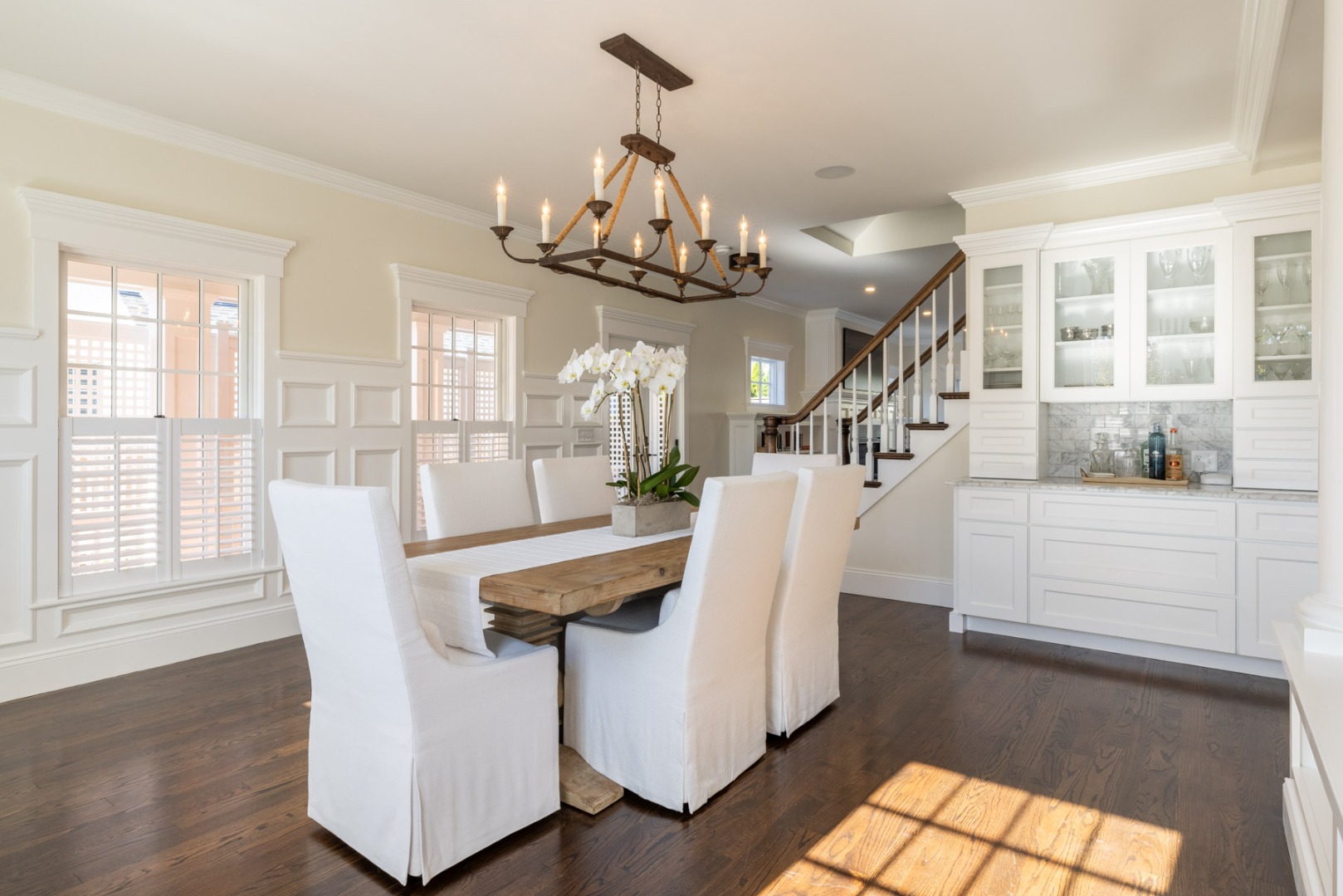 183 Upper Main Street Edgartown, MA 02539 - Photo 9 of 33 a view of a dining room with furniture wooden floor and chandelier