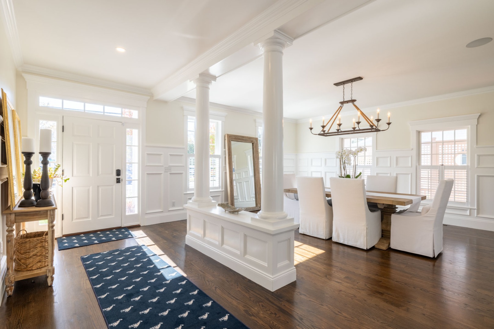 183 Upper Main Street Edgartown, MA 02539 - Photo 10 of 33 a living room with furniture and a chandelier