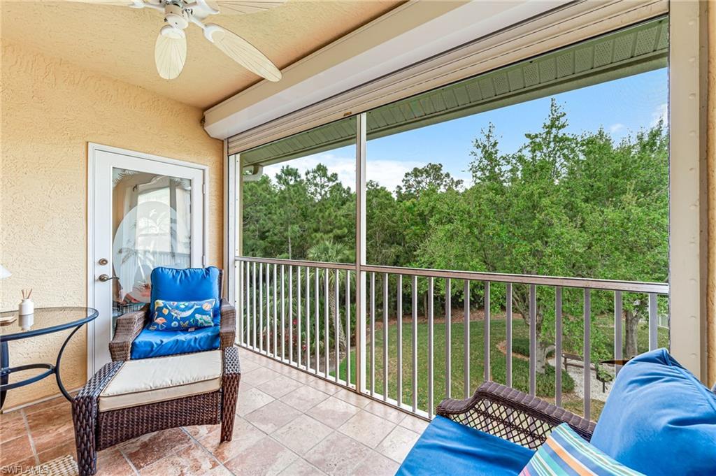 9185 Celeste Drive, Unit 305 Naples, FL 34113 - Photo 22 of 35 a view of a porch with furniture