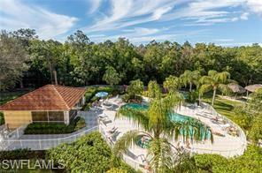 9185 Celeste Drive, Unit 305 Naples, FL 34113 - Photo 31 of 35 a view of a garden