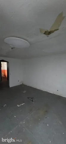 an empty room with an oven