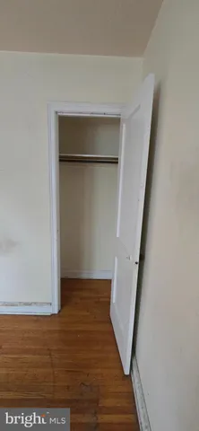 a view of a house with a tree