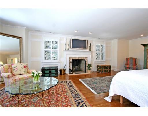 30 Pear Tree Point Road Darien, CT 06820 - Photo 14 of 20 a living room with furniture and a fireplace