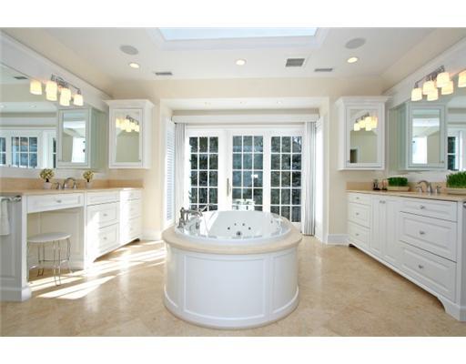 30 Pear Tree Point Road Darien, CT 06820 - Photo 15 of 20 a living room with kitchen island furniture and a fireplace