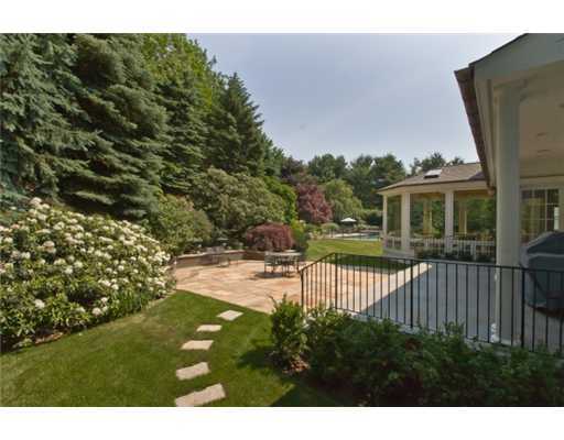 30 Pear Tree Point Road Darien, CT 06820 - Photo 18 of 20 a view of a house with backyard and sitting area