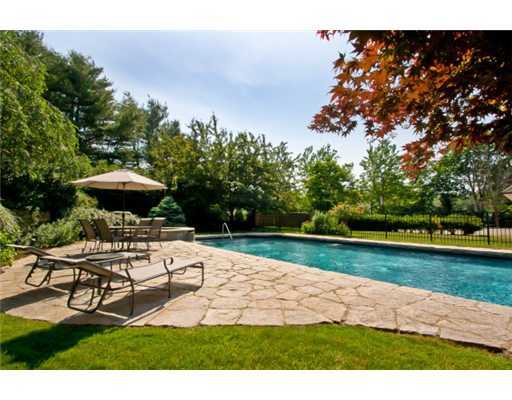 30 Pear Tree Point Road Darien, CT 06820 - Photo 19 of 20 a view of a backyard with sitting area