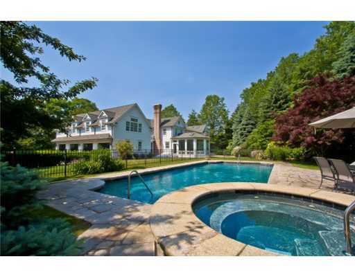 30 Pear Tree Point Road Darien, CT 06820 - Photo 2 of 20 a view of a swimming pool with a garden