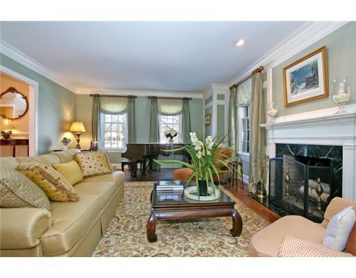 30 Pear Tree Point Road Darien, CT 06820 - Photo 4 of 20 a living room with furniture and a fireplace