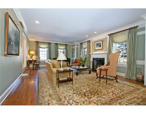 30 Pear Tree Point Road Darien, CT 06820 - Photo 5 of 20 a living room with furniture and a fireplace