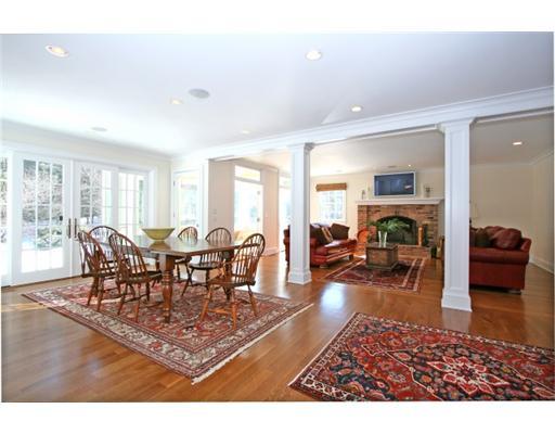 30 Pear Tree Point Road Darien, CT 06820 - Photo 10 of 20 a living room with furniture a wooden floor and a large window