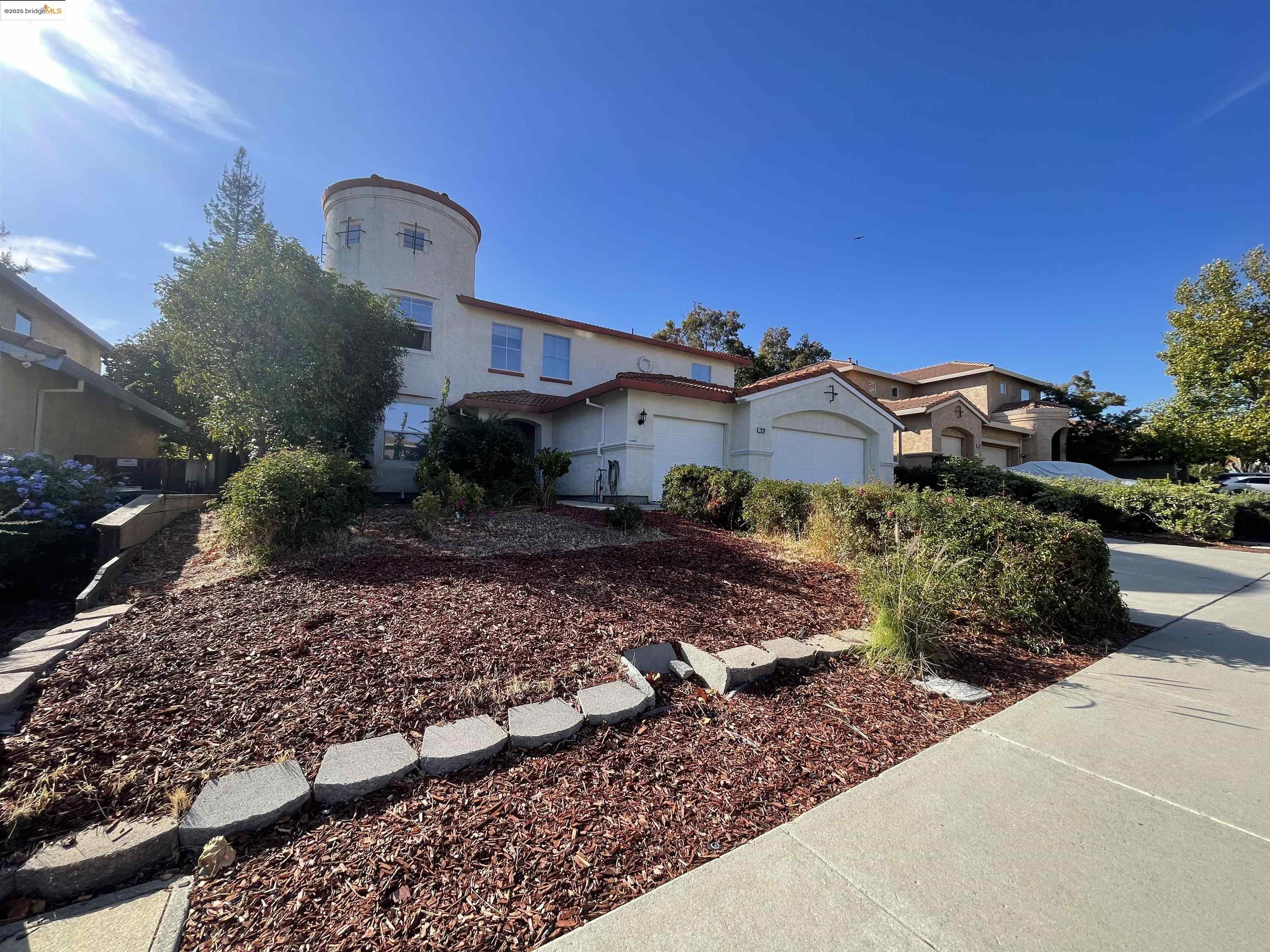 1928 Badger Pass Way Antioch, CA 94531 - Photo 1 of 50 a front view of a house with a yard and garage