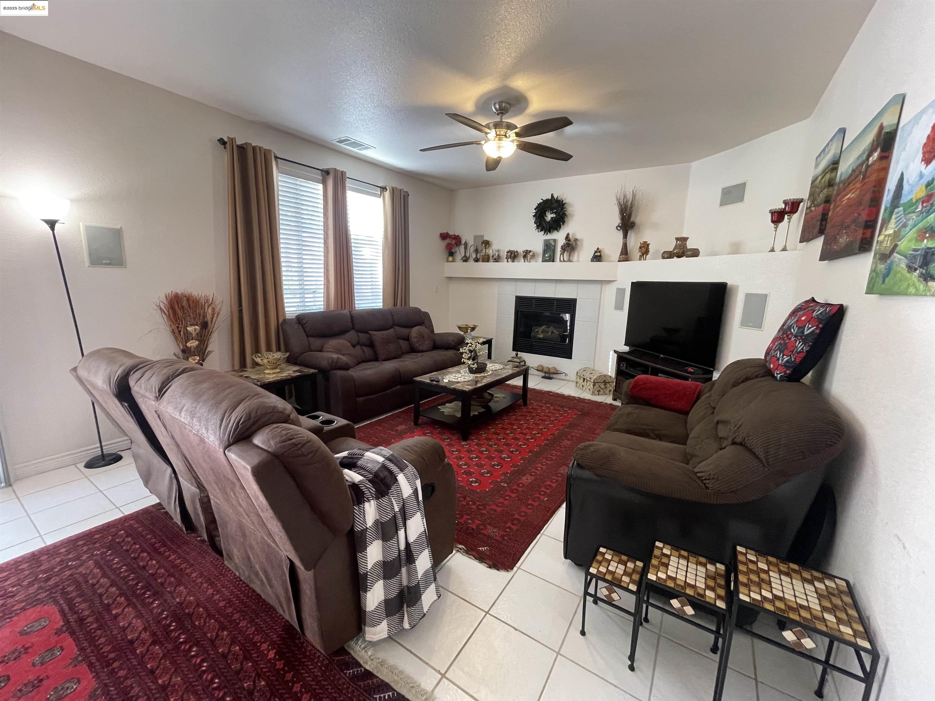 1928 Badger Pass Way Antioch, CA 94531 - Photo 13 of 50 a living room with furniture fireplace and a window