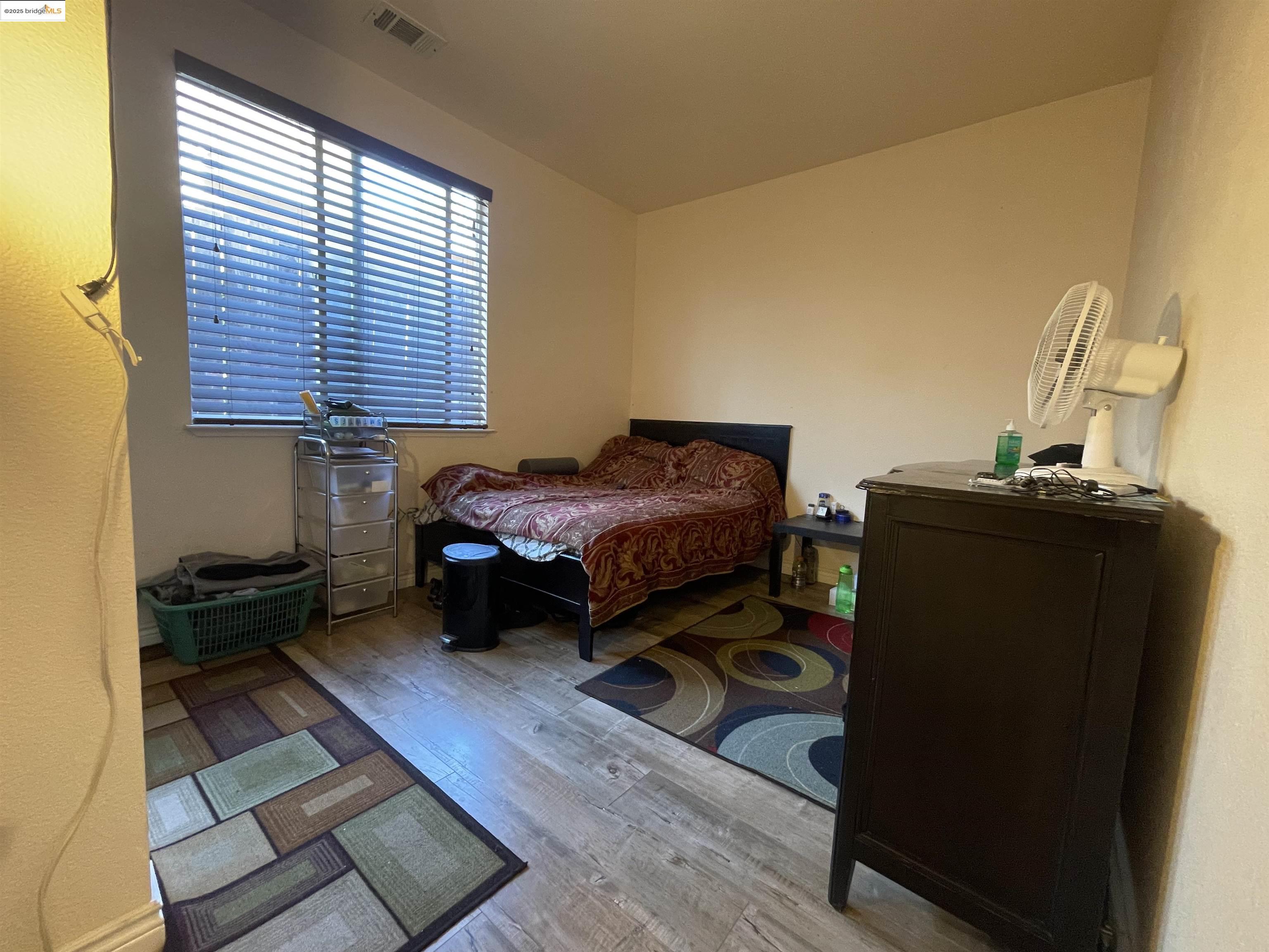 1928 Badger Pass Way Antioch, CA 94531 - Photo 16 of 50 a bedroom with a bed and a window