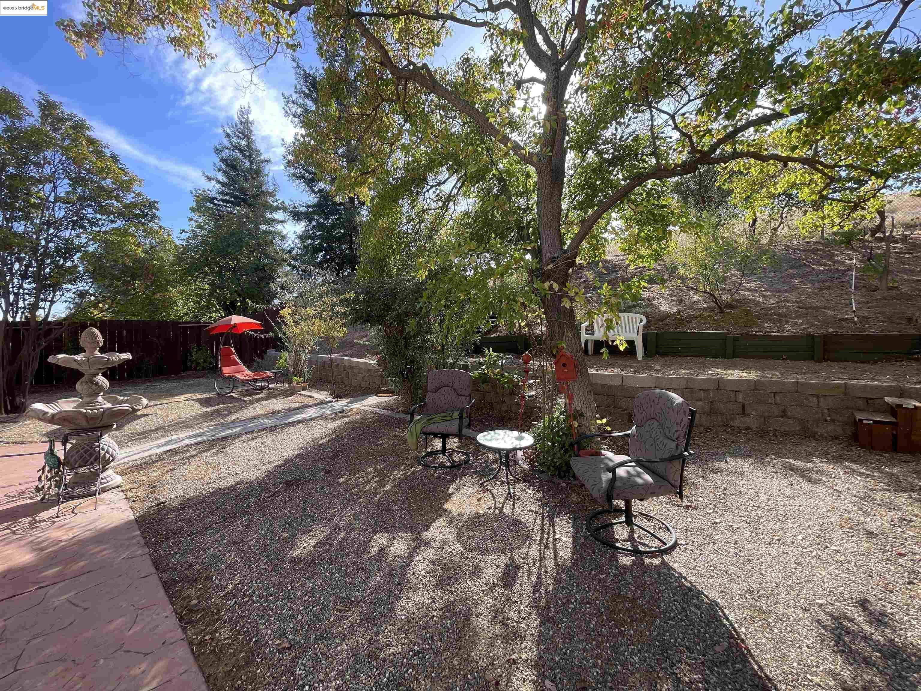 1928 Badger Pass Way Antioch, CA 94531 - Photo 29 of 50 a backyard of a house with table and chairs