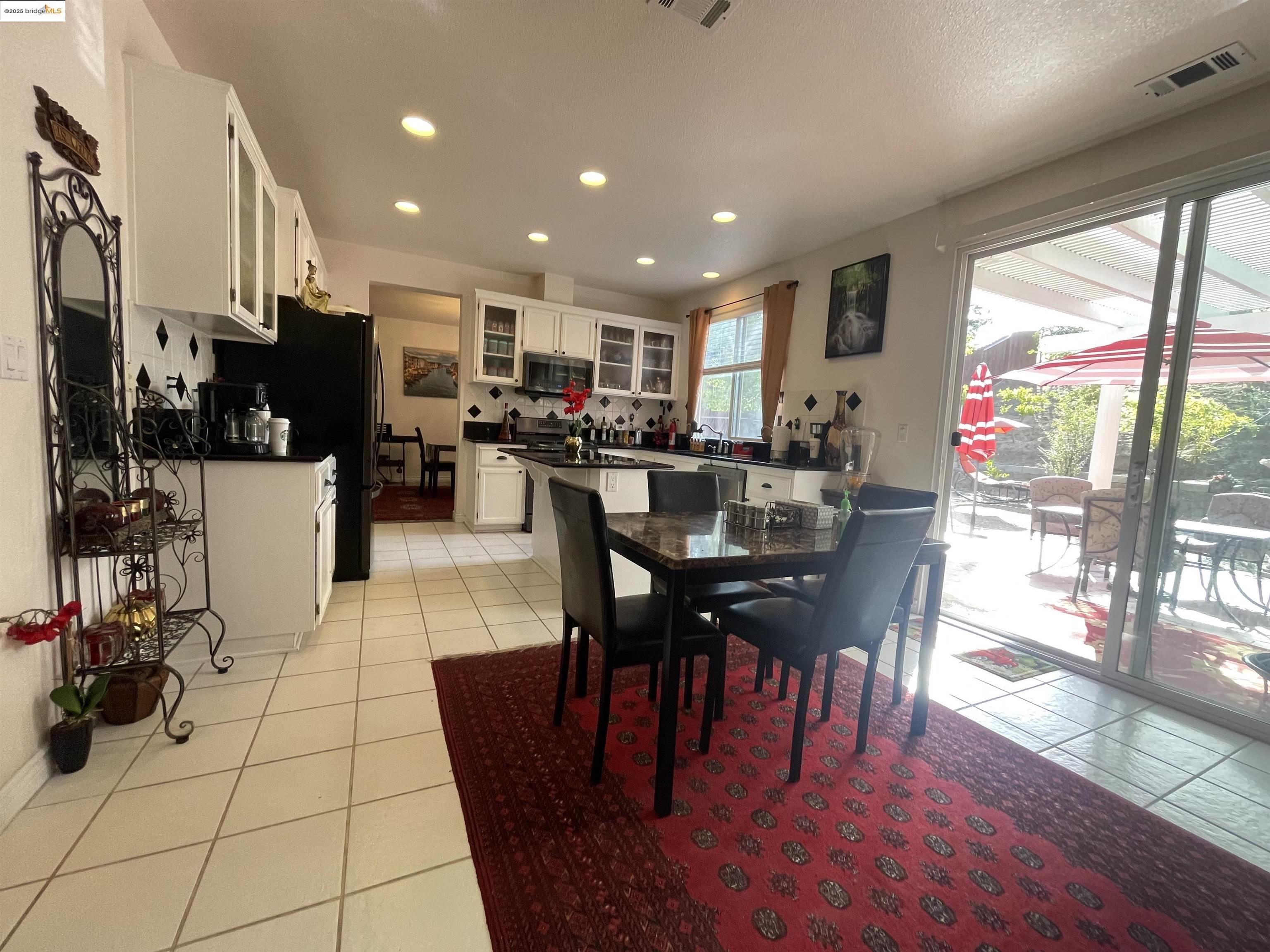 1928 Badger Pass Way Antioch, CA 94531 - Photo 34 of 50 a view of a dining room with furniture window and outside view