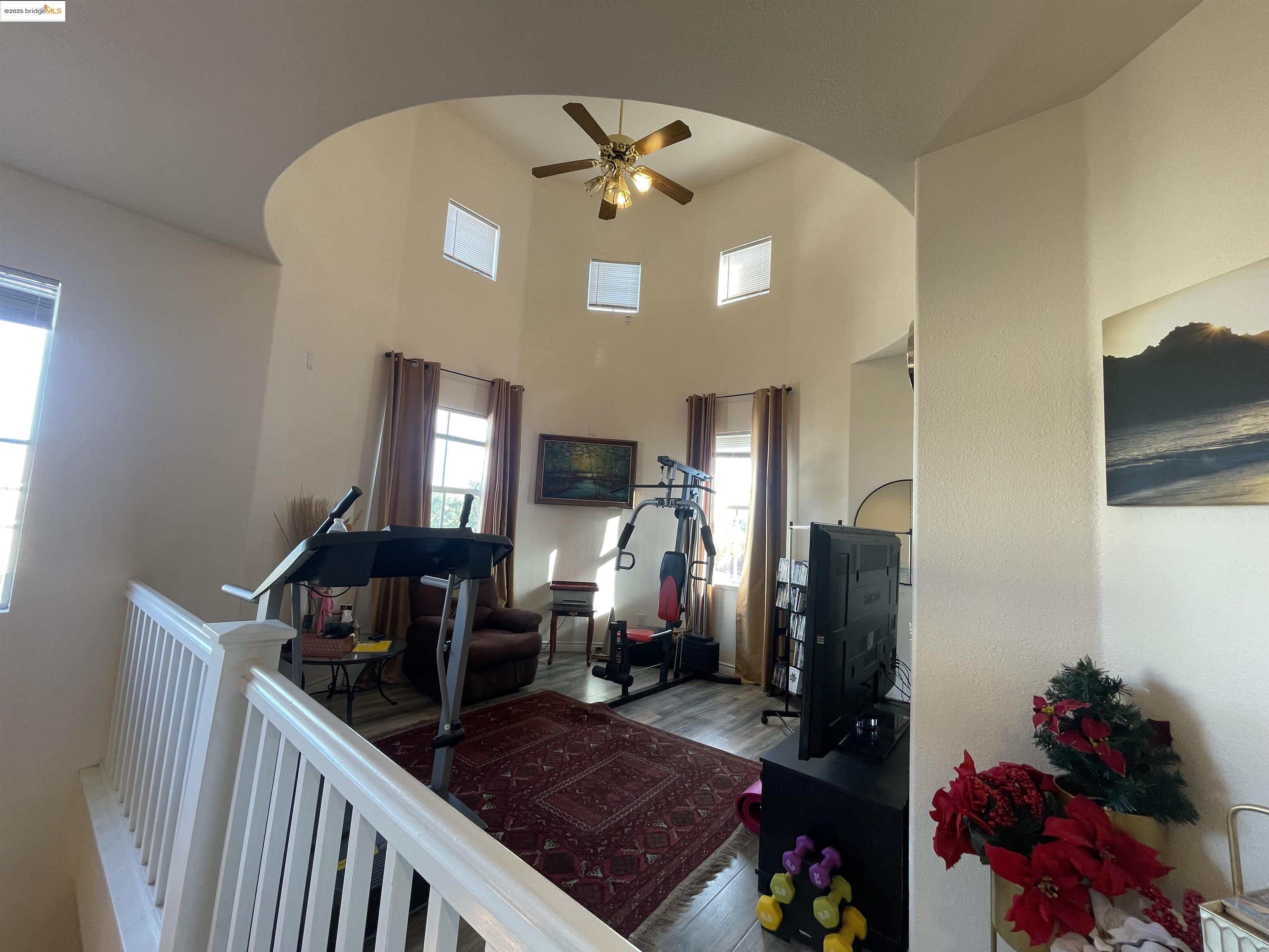 1928 Badger Pass Way Antioch, CA 94531 - Photo 40 of 50 a living room with furniture and a chandelier