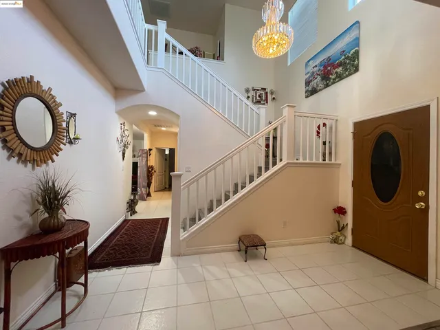 a view of entryway with workspace and a rug
