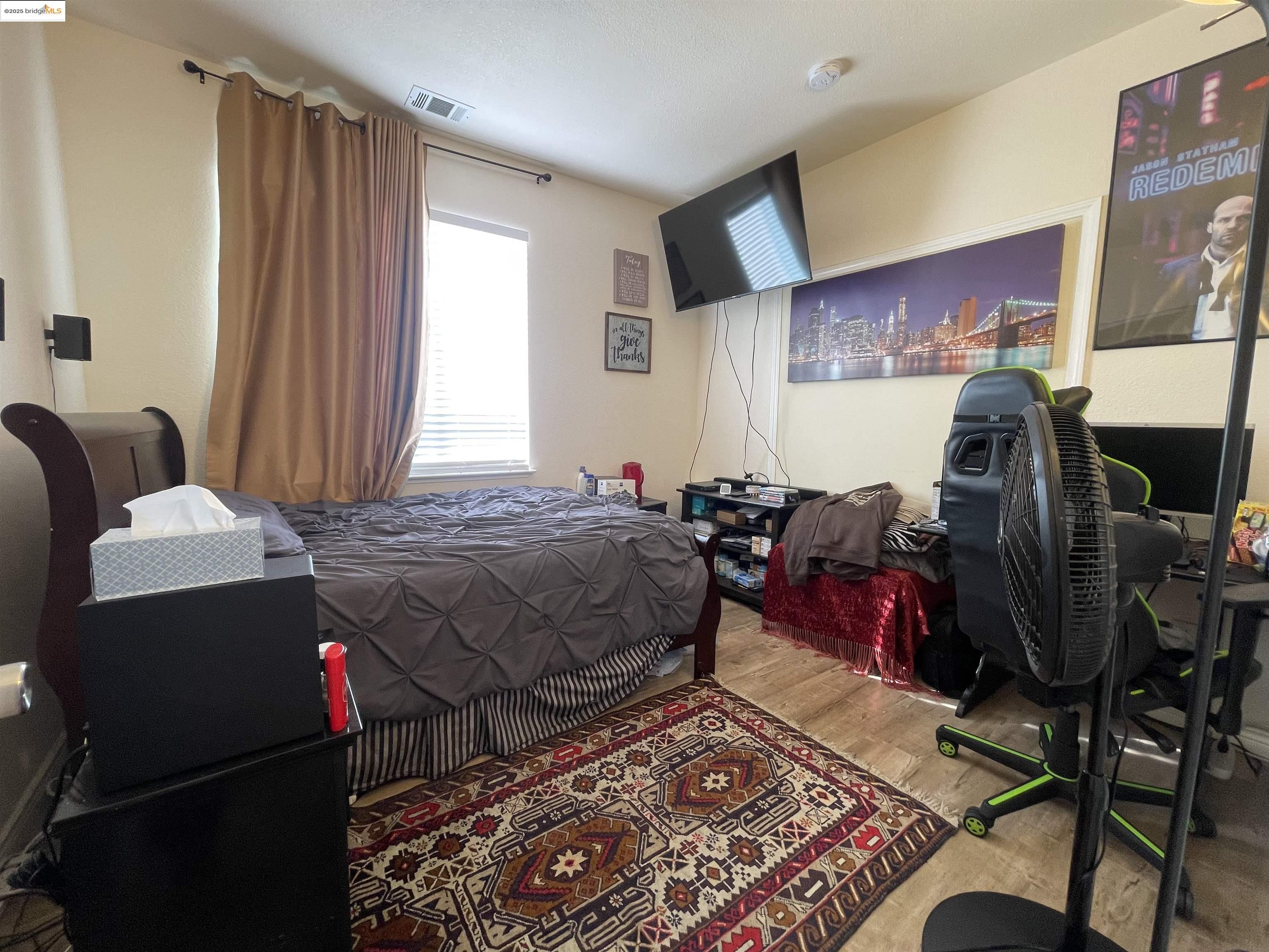 1928 Badger Pass Way Antioch, CA 94531 - Photo 43 of 50 a bed room with a bed closet and a window