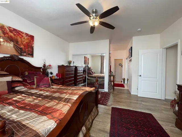 a bed room with a bed and a window